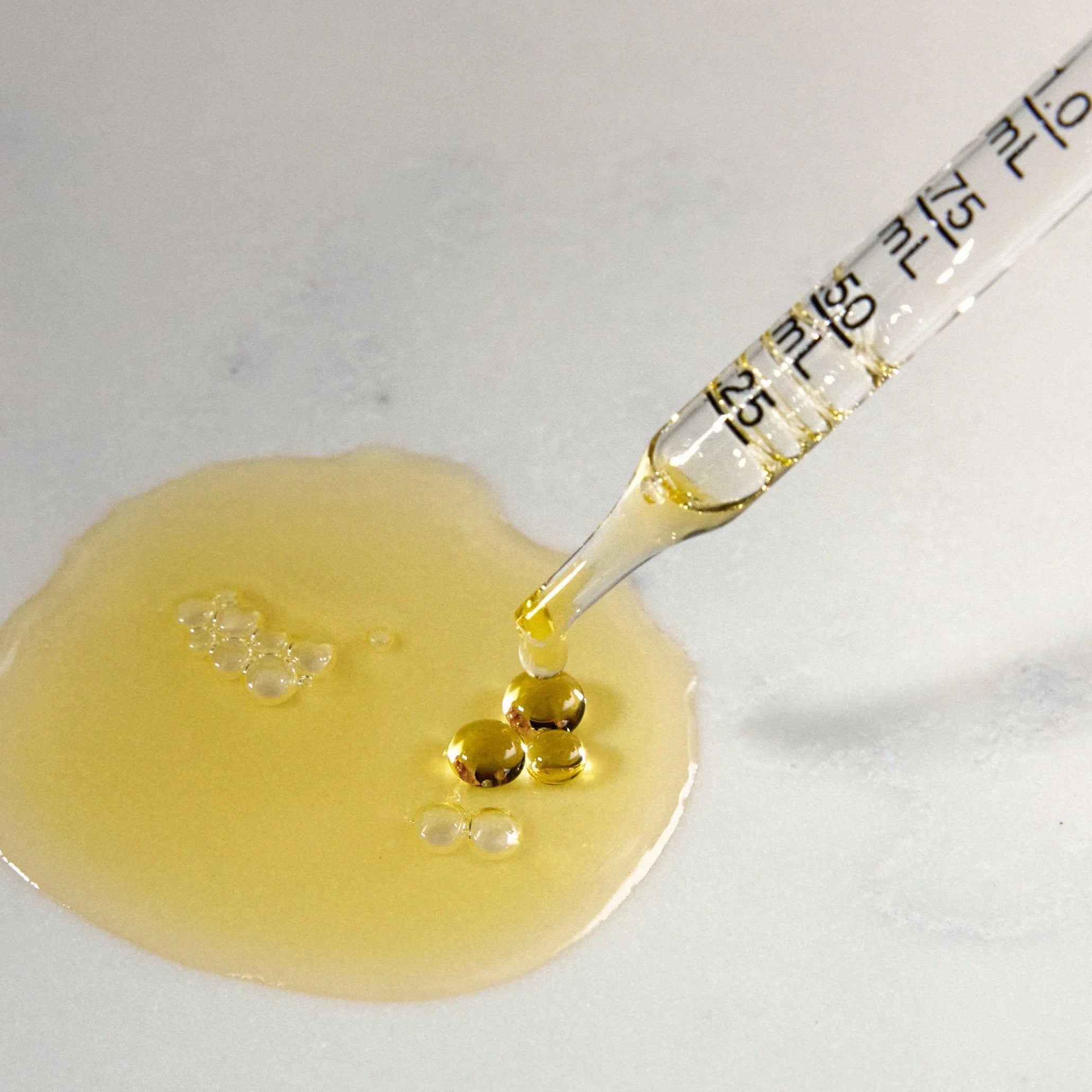 Gold oil with glass dropper