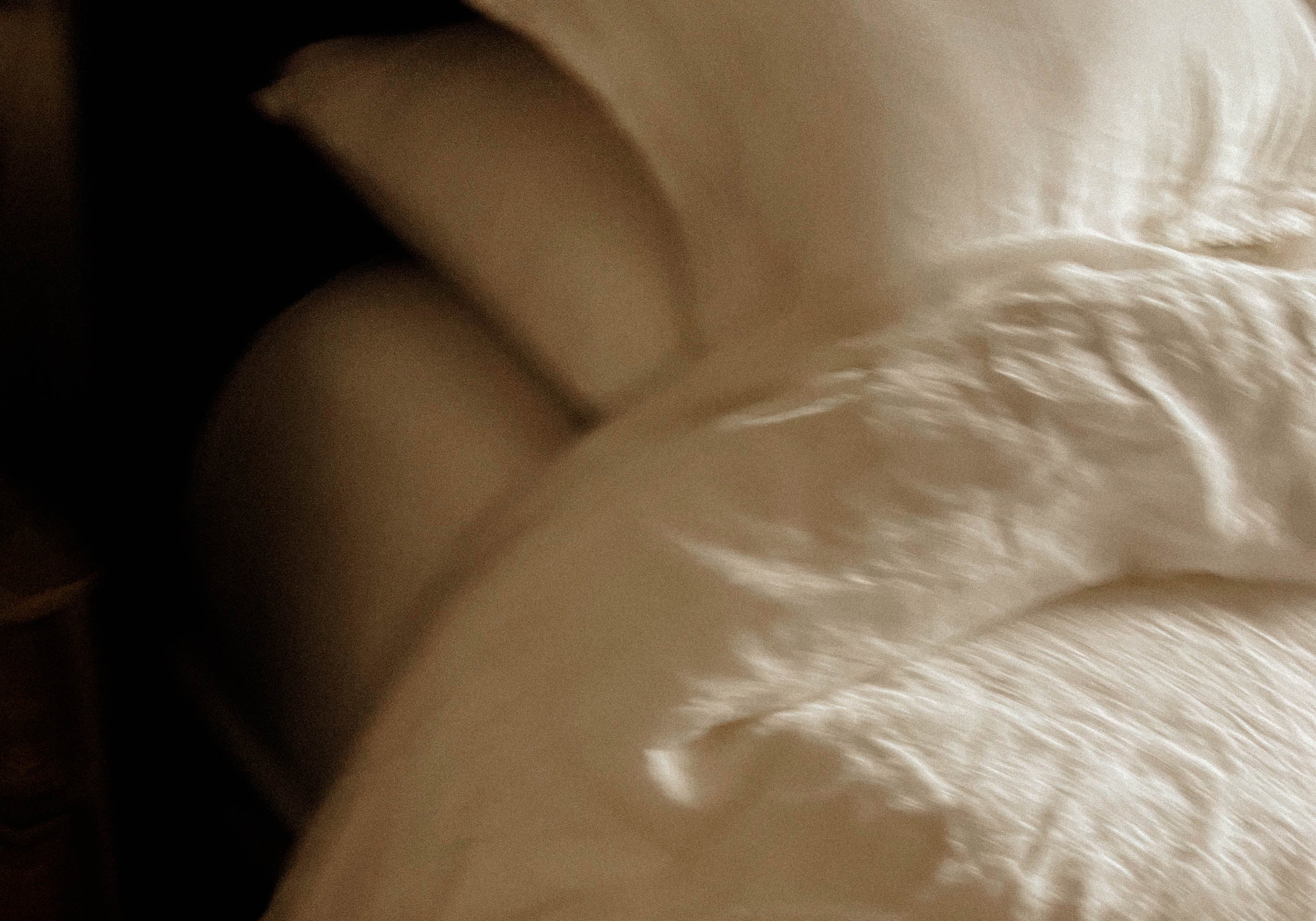 Close-up of a textured beige fabric surface