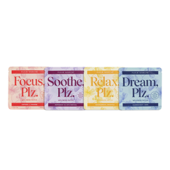 A set of four packaged wellness supplements from Fleur Marché, labeled Focus, Soothe, Relax, and Dream, each in a distinctively colored wrapper.