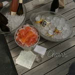 Chill Pops and Beverages in ice on a wooden table with 'Cheers' text