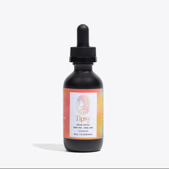A dark amber glass dropper bottle with a black cap and a peach and orange label featuring the brand name 'Tipsy'. The bottle is centered against a clean, light gray background with a soft shadow.